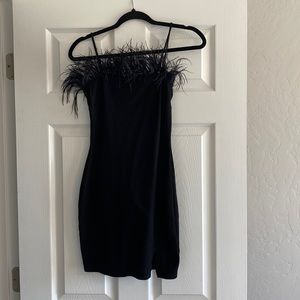 Black feathered bodycon dress. Worn once